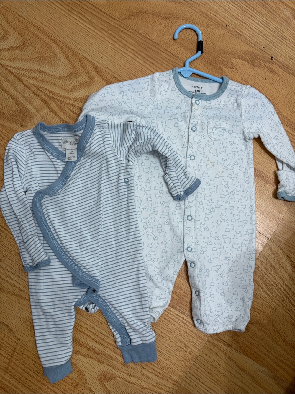 Carter's and Little PlanetWhite & Light Blue Baby one piece. Set of two